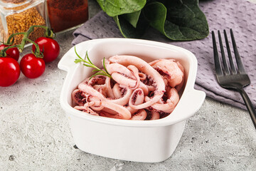 Marinated squid tentacles in the bowl