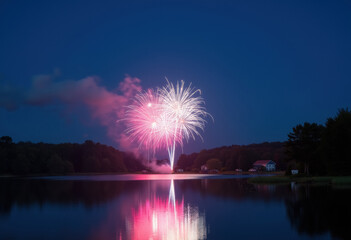 Fireworks over lake at night