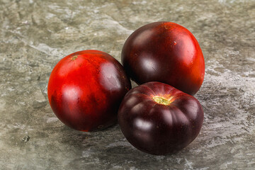 Black ripe juicy organic tomato