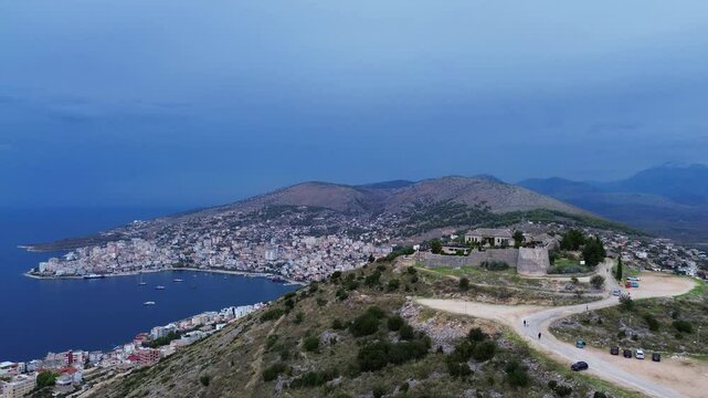 Lekuresi castle ruin Kajala e L&euml;kur&euml;sit Saranda Albania city aerial view