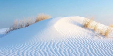 Fototapeta premium A detailed view of a white sand dune as the sun sets, capturing the serene beauty of the dune at dusk. The white sand glows in the evening light.
