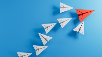 business. Leaderplane concept image with paper planes on blue wooden background. One leader guiding others.3D rendering on blue background.