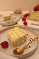 Piece of vanilla cake with raspberries