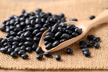 Black bean with wooden scoop, Food ingredient