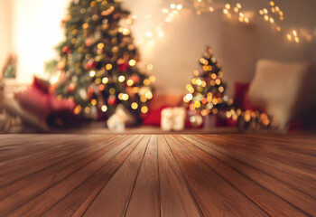 A close up of a wooden surface with a Christmas tree and presents in the background.
