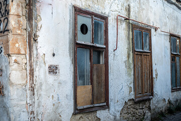 Old vintage wooden windows on old house