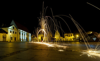 The Dance of Light and Fire in the Evening at Kėdainiai Old Town