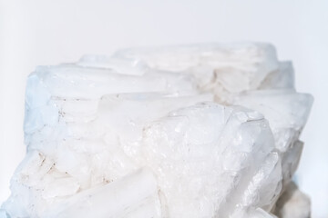 A Detailed Close-Up of a White Satin Spar Gypsum Rock, Showcasing Its Unique Texture and Crystalline Structure