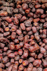 small sized dates in large quantity, dates in large quantity, ark color dates, Healthy food, Natural food, Dried Fruit, dates on a market stall, 
