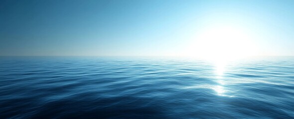 Tranquil Ocean Landscape: Blue Water, Clear Sky, and Sun Reflection