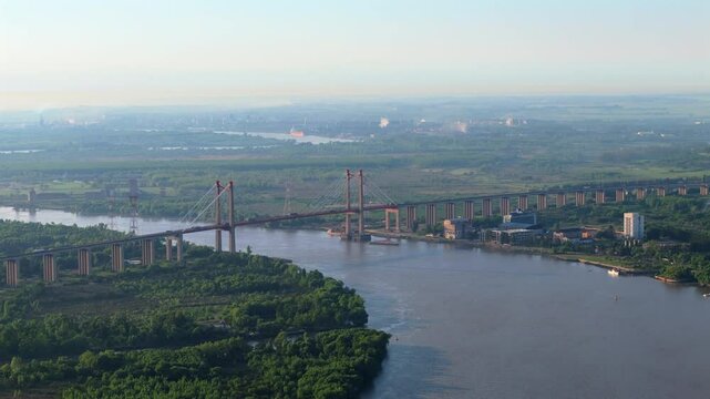 Flying over suspension bridge Z&aacute;rate Brazo Largo over Paran&aacute; River, Argentina