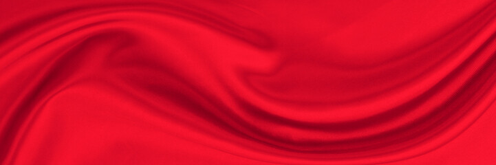 Black red satin dark fabric texture luxurious shiny that is abstract silk cloth background with patterns soft waves blur beautiful.