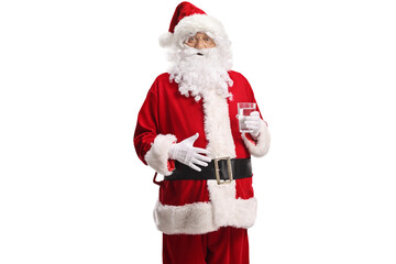 Santa claus drinking a glass of water
