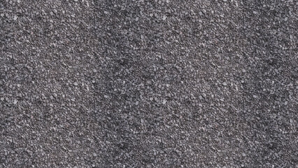 A close-up, top-down view of fine gravel texture, filling the entire frame