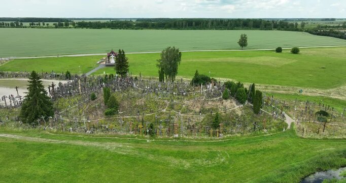 aerial view of the Hill of crosses in Siauliai, Lithuania. The Hill of Crosses is a unique sacral site covered in 200,000 crosses of various shapes and sizes. It is a place of pilgrimage and prayer,