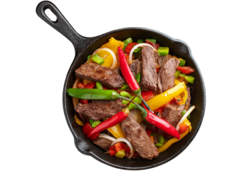 Mexican steak fajitas in cast iron skillet isolated on transparent or white background