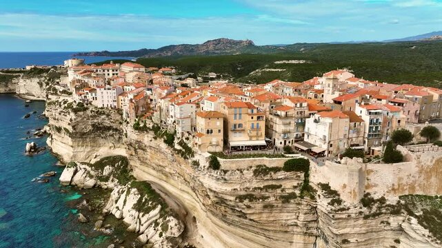 Discover the stunning coastal beauty of Bonifacio, Corsica, with its historic cliffside village and breathtaking views of the turquoise Mediterranean Sea