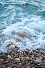 sea wave rolling on the rocks