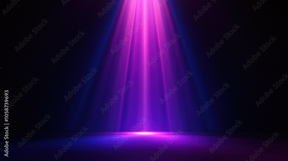 Wall mural a spotlight shines brightly from above with a dark background.