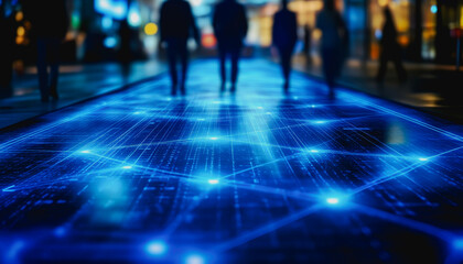 Discover an expansive digital floor design featuring intricate glowing blue patterns. This modern scene captures silhouettes of people against a vibrant, illuminated backdrop.