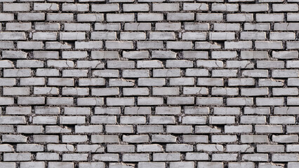 Obraz premium cracked gray brick texture: close-up of light gray bricks with visible cracks and rough texture, providing a distressed, industrial aesthetic that adds character to urban designs