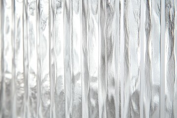 A close-up shot of a curtain with a curious cat peeking out from behind, suitable for use in home decor or pet-related designs