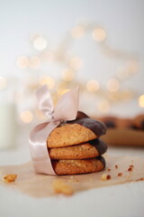 Chip cookies dipped in a chocolate with a bow