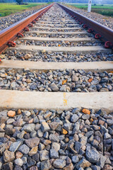 The view of the train tracks in the morning in rural Indonesia creates a romantic atmosphere