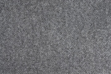 gray fabric drape coat texture background close up. dense fabric based on wool fibers