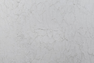 Naklejka premium White concrete wall texture background. cement wall. plaster texture for designers. Rough empty relief stucco wall