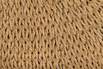 Woven straw texture background. Natural woven straw. Wicker cloth. Wooden mat pattern