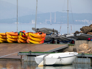 Boats and kayaks in storage on the coast in Bay area. Can Picafort, Majorca, Island in Spain. Kayak...