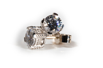 Diamond earrings. Big diamond earrings, large solitaire earrings on white background.