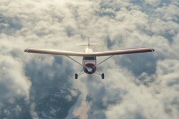 Small airplane flying through clouds