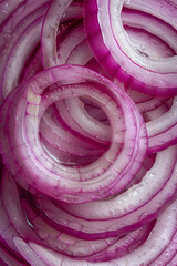 Fototapeta premium Vertical Close-up image of sliced red onion.
