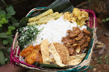 Sri Lanka traditional lunch on a palmyra leaf basket