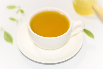 Put a cup of tea serving on white background with isolated style.