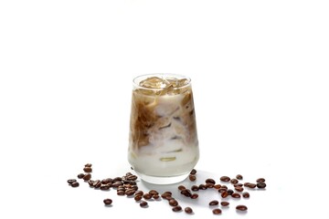 Pictures of latte ice coffee mix with milk serving on white background with coffee beans spread around glass in Isolated photo concept.