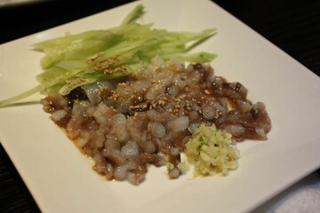 chopped live octopus, cucumbers, and wasabi