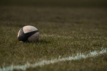 Rugby ball on a grass pitch