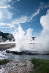 Blacksand Basin Geyser as it erupts due to the boiling water pressure building up underneath Yellowsotne