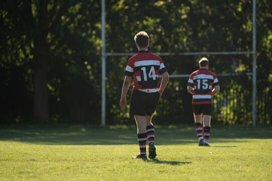 Rugby players on a grass pitch