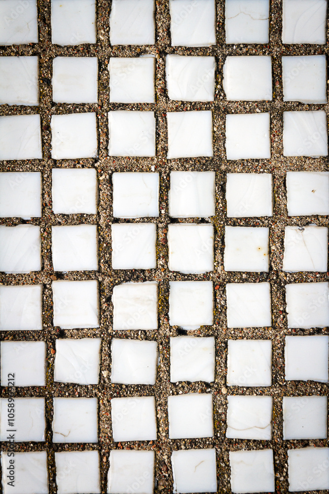 Canvas Prints Texture of the old tile wall. Square white small tiles on concrete texture