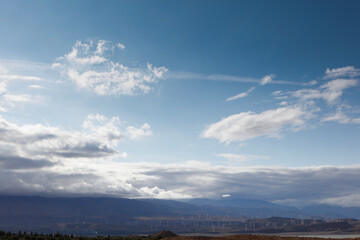 Stunning nature view of mountains and beautiful cloudy sky meadow
