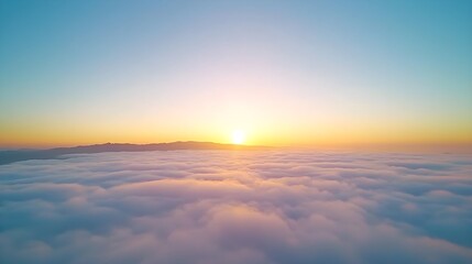 Serene sunrise above a sea of clouds