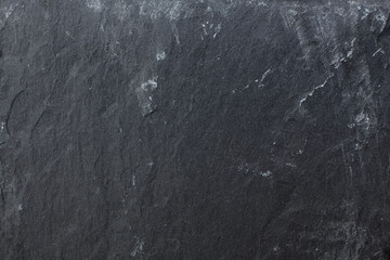 Dunkelgrauer, schwarzer Schieferhintergrund oder Textur