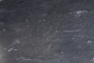 Dunkelgrauer, schwarzer Schieferhintergrund oder Textur