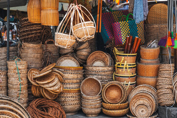 A traditional market in Vietnam with goods made of rattan, bamboo and palm leaves.
