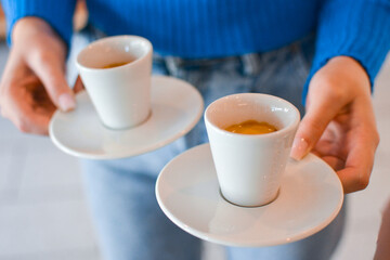 woman holding a cup of coffee
