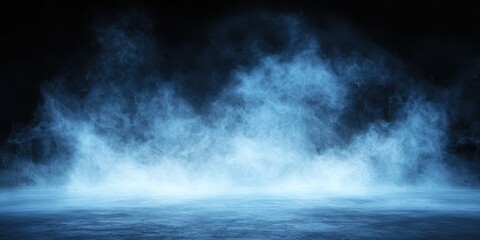 Fototapeta premium Blue mist and smoke swirling against a dark background, creating an atmospheric and mysterious effect.